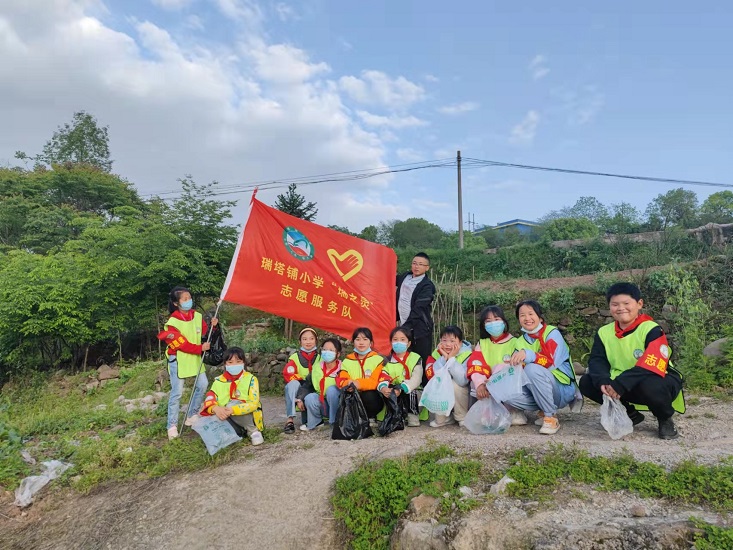 瑞塔铺小学：携手“净滩”  守护一方绿水